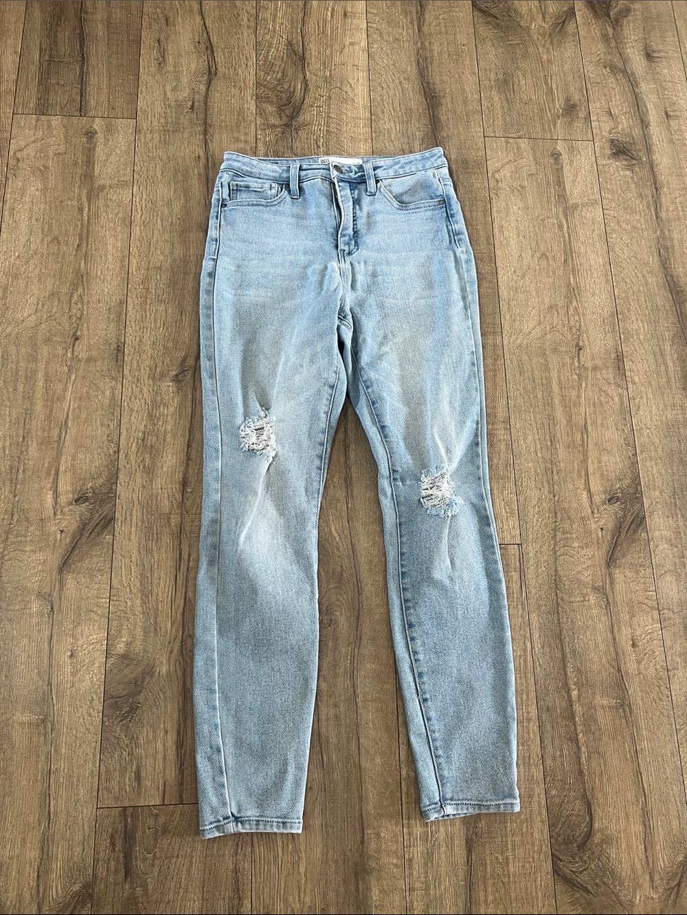 Light Blue High-Waist Distressed Women’s Jeans